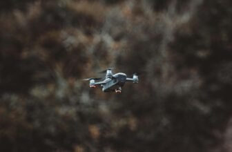 This is a scenic view captured by a drone, showcasing a traveler exploring breathtaking landscapes.
